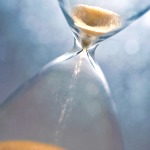 glass hourglass with time running out  - SELL 1 GET 1 FREE Q1 2011