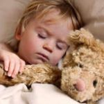 baby toddler asleep with teddy bear